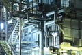 Industrial building at night Royalty Free Stock Photo