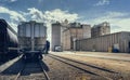 Industrial building and rail road track with cargo containers