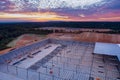 Industrial building roof truss frame installation the construction in steel warehouse Royalty Free Stock Photo