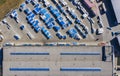 Industrial building and warehouse with trucks. Aerial View Royalty Free Stock Photo