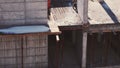 Industrial Building Workers Doing Job Raw Fundament Concrete Cement Using Tools Hard Job Labor Construction In Progress