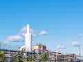 Industrial buildings on a background of blue sky with copy space. Chemical production. Production structures Royalty Free Stock Photo