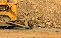 Industrial bulldozer moving earth pit or quarry Royalty Free Stock Photo