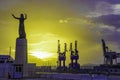 Industrial cargo port cranes in Palermo at sunrise, Sicily Royalty Free Stock Photo