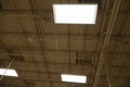 Industrial ceiling Warehouse with Three Multi Buld Lights Royalty Free Stock Photo