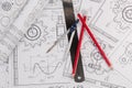 Industrial chain drawings, engineering compass, ruler and pencils Royalty Free Stock Photo