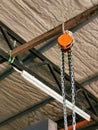 Industrial chain hoist for lifting heavy object in the factory. Royalty Free Stock Photo