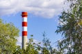 Industrial chimney on blue sky