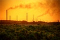 Industrial chimney stacks polluting the air