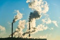 Industrial chimneys smoke. Dirty smoke on a background sky, ecological problems