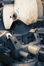 Industrial circular saw machine in a factory workshop