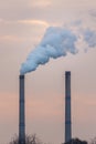 Industrial cityscape with coal power plant and smoke stacks Royalty Free Stock Photo