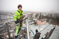 Industrial climber on a metal construction