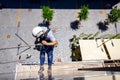 Industrial climber is washing, cleaning facade of a modern office building Royalty Free Stock Photo