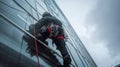 Industrial Climber Washing High-Rise Windows in the Snow. Generative ai