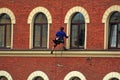 Industrial climber washing the windows