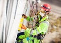 Industrial climber during winterization works Royalty Free Stock Photo