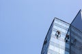 industrial climbers clean windows of high-rise buildings Royalty Free Stock Photo