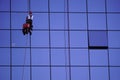 Industrial climbing, cleaning of Windows, glass elements of the building. maintenance of skyscrapers. hard work