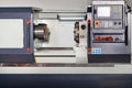 Industrial CNC lathe with control panel. Close-up. Copy space Royalty Free Stock Photo