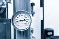 Industrial concept. equipment of the boiler-house, - valves, tubes, pressure gauges, thermometer. Close up of manometer, pipe, fl