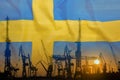 Industrial concept with Sweden flag at sunset Royalty Free Stock Photo