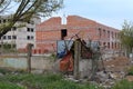 Industrial concrete building destructed by earthquake strike. Disaster scene full of debris Royalty Free Stock Photo