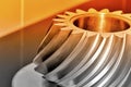 Industrial conical gear with spiral machine teeth.