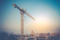 Industrial construction cranes and building in construction site Royalty Free Stock Photo