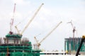 Industrial construction Cranes on construction site Royalty Free Stock Photo
