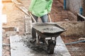 Labor work concrete with cart Royalty Free Stock Photo