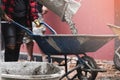 Labor work concrete with cart Royalty Free Stock Photo