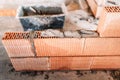 construction site details with worker laying bricks on interior walls Royalty Free Stock Photo