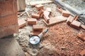 Industrial construction site tools, angle grinder used for cutting bricks at building renovation, reconstruction Royalty Free Stock Photo