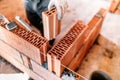 construction worker using spatula and trowel for building walls with bricks and mortar Royalty Free Stock Photo