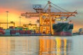 Industrial Container Cargo freight ship with working crane Royalty Free Stock Photo