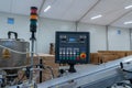 Industrial control panel of automated packaging machine in modern factory hall Royalty Free Stock Photo
