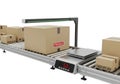 Industrial conveyor belt system transporting various cardboard boxes, including fragile and handle with care packages, with a Royalty Free Stock Photo