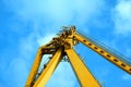 Industrial Crane operating and lifting an electric generator Royalty Free Stock Photo