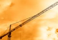 Industrial crane sunset background Royalty Free Stock Photo
