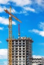 Industrial Crane Working on Construction Site