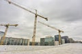 Industrial cranes building Oslo city background