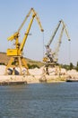 Industrial cranes in harbor