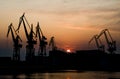 Cranes at Sunset in Harbor of Pula in Croatia Royalty Free Stock Photo