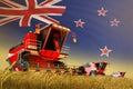 Agricultural combine harvester working on farm field with New Zealand flag background, food production concept - industrial 3D Royalty Free Stock Photo