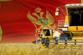 industrial 3D illustration of 3 yellow modern combine harvesters with Montenegro flag on wheat field - close view, farming concept