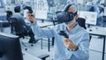 Industrial Design Engineer Wearing Virtual Reality Headset and Holding Controllers, Uses VR techno Royalty Free Stock Photo