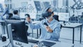 Industrial Design Engineer Wearing Virtual Reality Headset and Holding Controllers, Uses VR techno Royalty Free Stock Photo