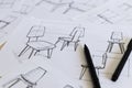 Industrial design sketching of ideas for chair concepts