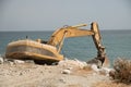 This is an industrial digger on a beach Royalty Free Stock Photo